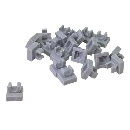 LEGO® Tile Modified 1 x 1 with open O clip (15712) in light bluish gray, a small connector tile with a circular side clip.
