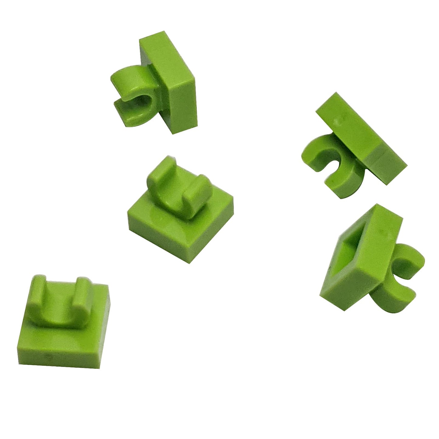 LEGO® Tile Modified 1 x 1 with open O clip (15712) in lime, a small connector tile with a circular side clip.
