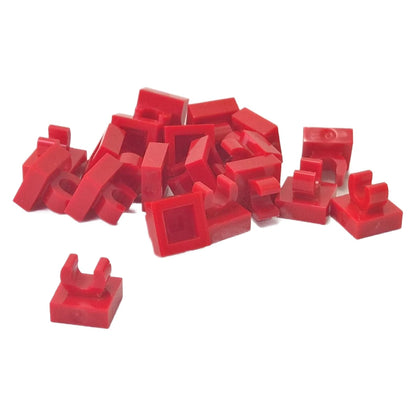 LEGO® Tile Modified 1 x 1 with open O clip (15712) in red, a small connector tile with a circular side clip.
