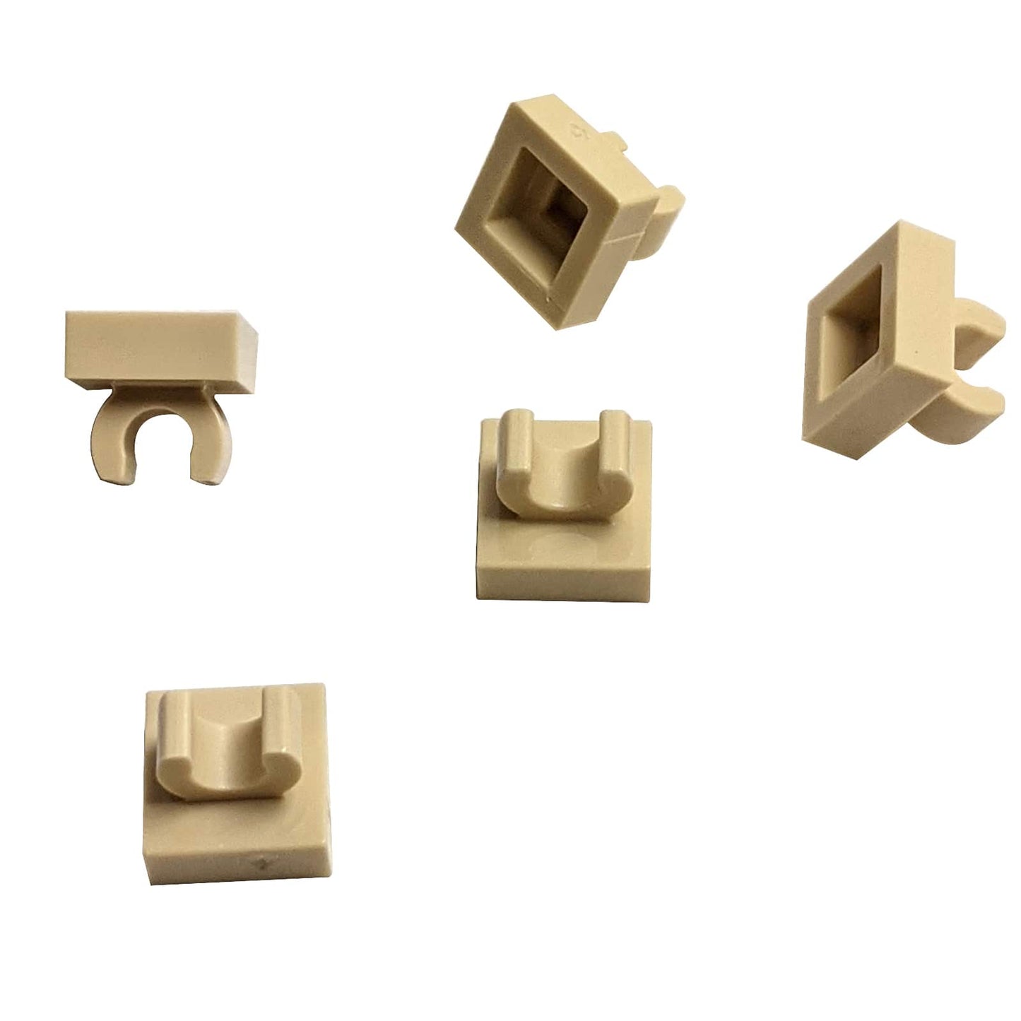 LEGO® Tile Modified 1 x 1 with open O clip (15712) in tan, a small connector tile with a circular side clip.

