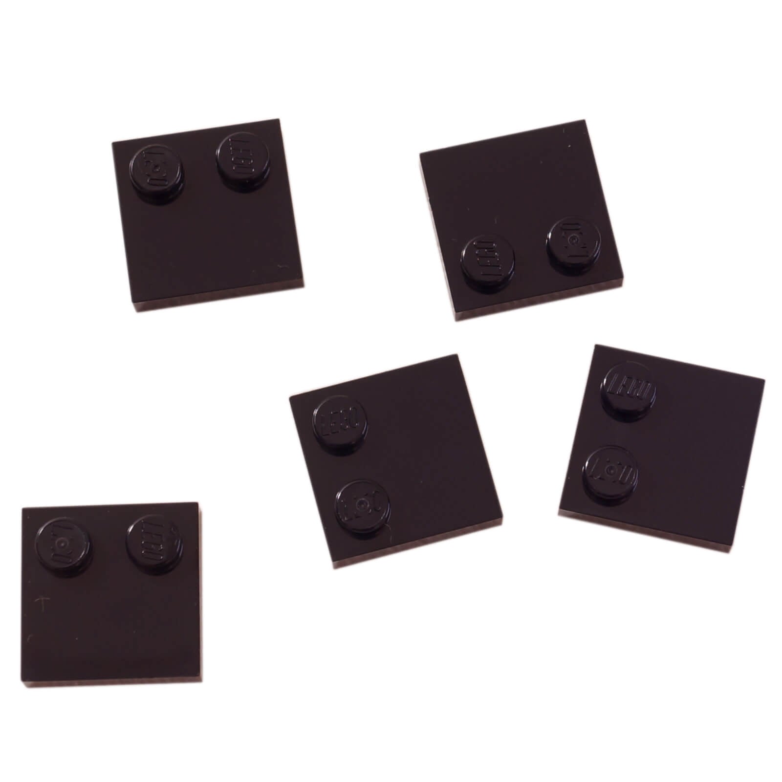 LEGO® Tile, Modified 2 x 2 with Studs on Edge (Part 33909) in black, used for SNOT techniques and detailed surface building
