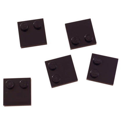 LEGO® Tile, Modified 2 x 2 with Studs on Edge (Part 33909) in black, used for SNOT techniques and detailed surface building
