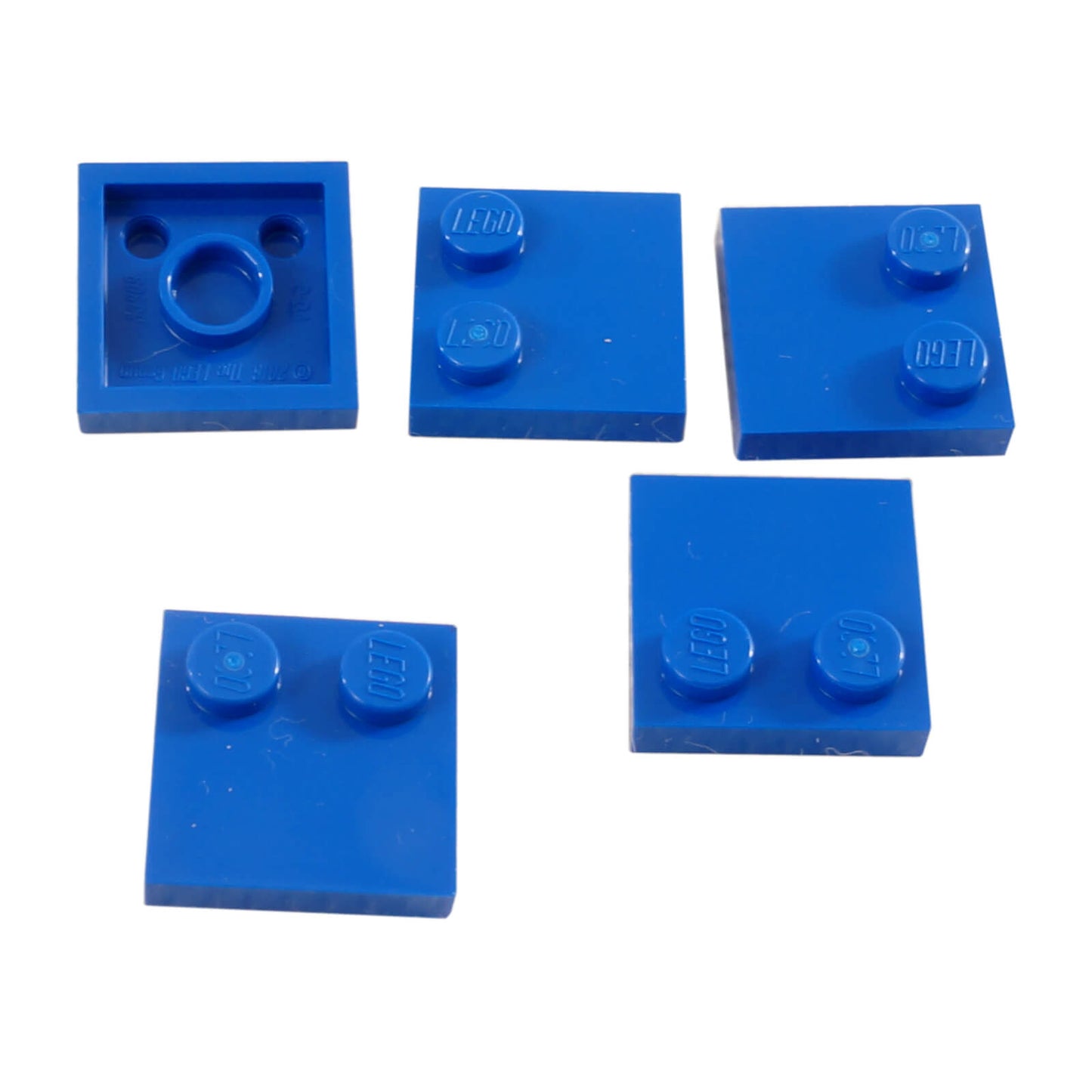 LEGO® Tile, Modified 2 x 2 with Studs on Edge (Part 33909) in blue, used for SNOT techniques and detailed surface building
