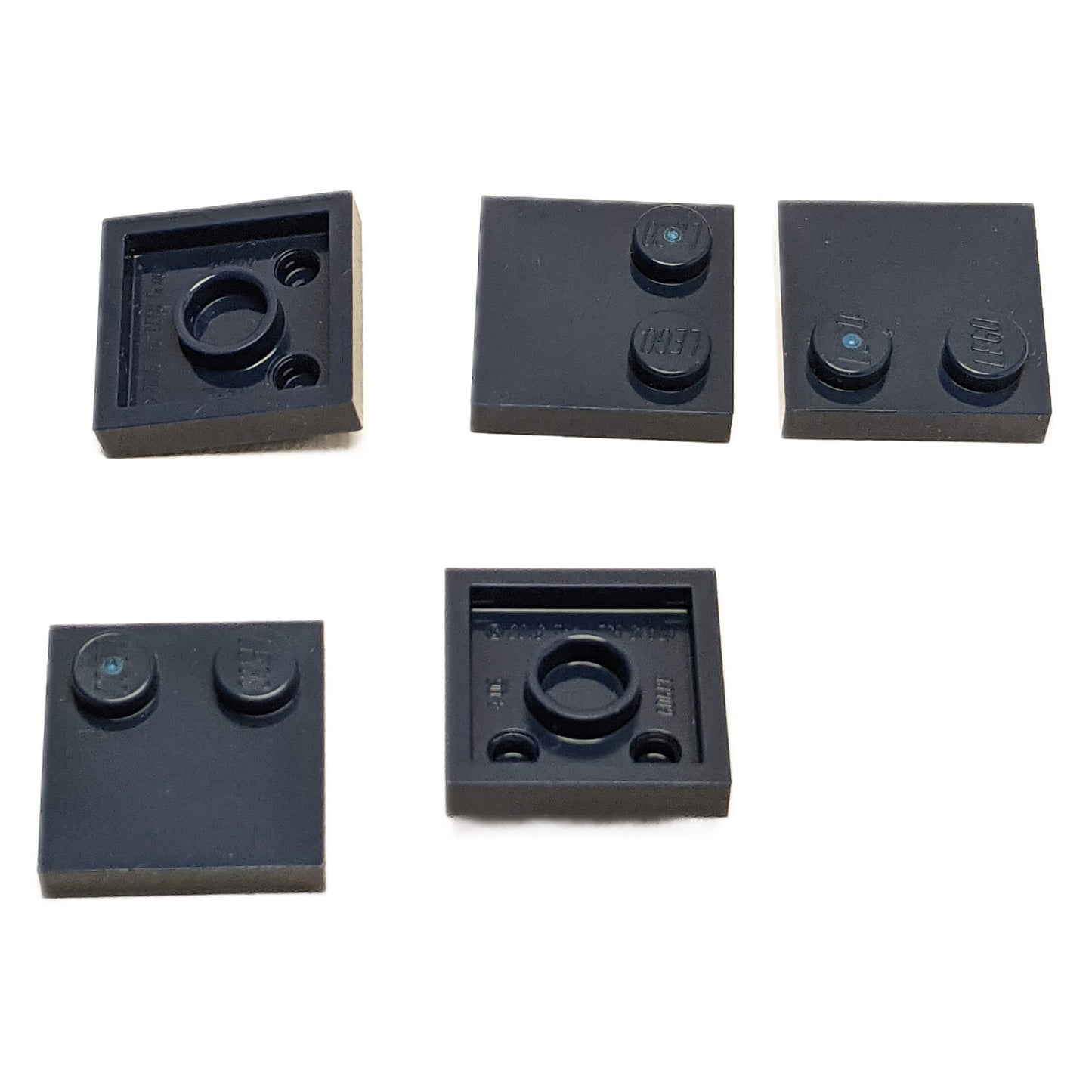 LEGO® Tile, Modified 2 x 2 with Studs on Edge (Part 33909) in dark blue, used for SNOT techniques and detailed surface building
