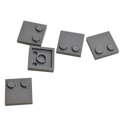 LEGO® Tile, Modified 2 x 2 with Studs on Edge (Part 33909) in dark bluish gray, used for SNOT techniques and detailed surface building
