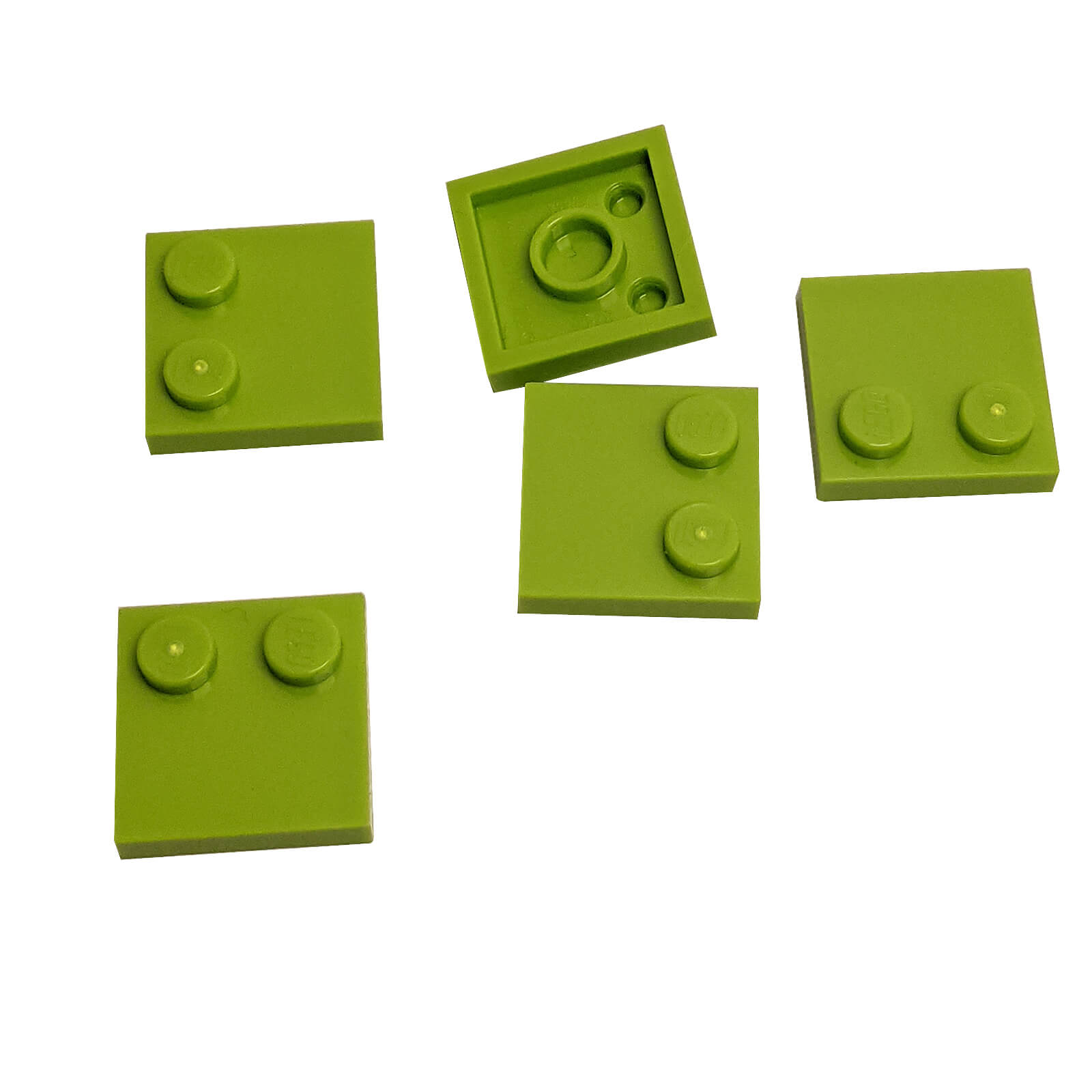LEGO® Tile, Modified 2 x 2 with Studs on Edge (Part 33909) in lime, used for SNOT techniques and detailed surface building
