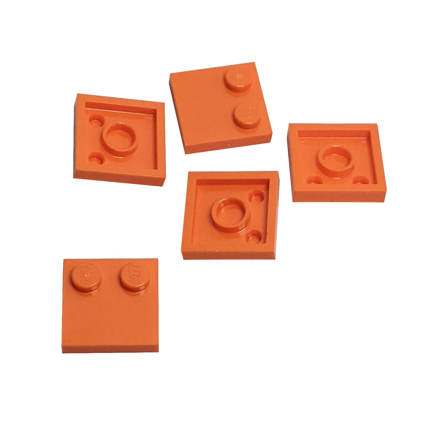 LEGO® Tile, Modified 2 x 2 with Studs on Edge (Part 33909) in orange, used for SNOT techniques and detailed surface building
