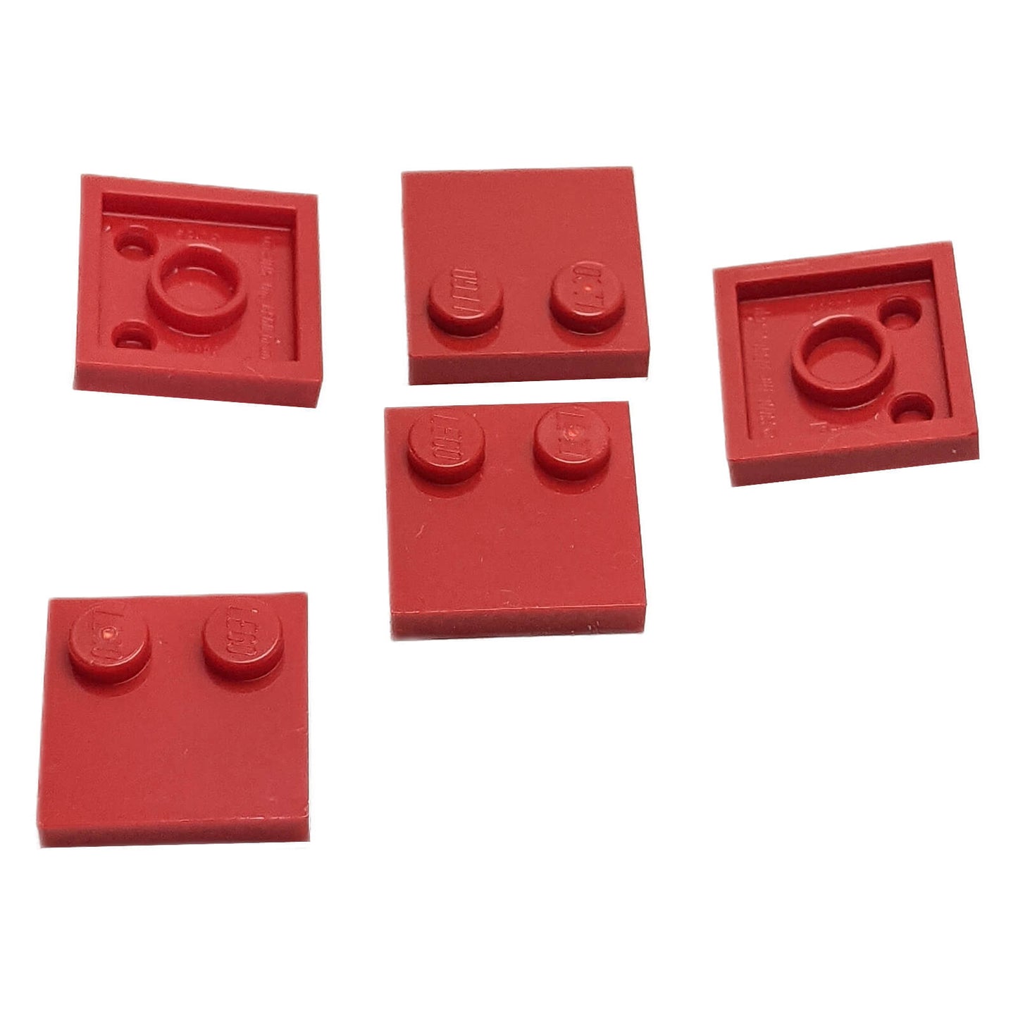 LEGO® Tile, Modified 2 x 2 with Studs on Edge (Part 33909) in red, used for SNOT techniques and detailed surface building
