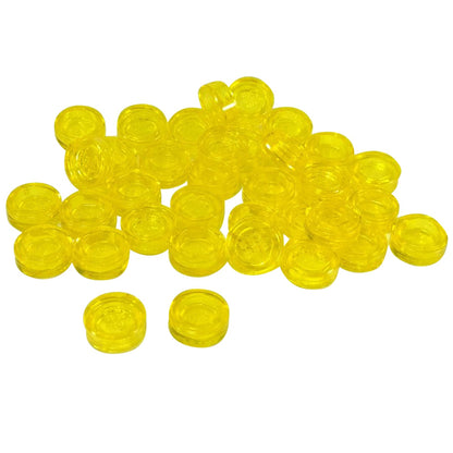 LEGO® round tile 1 x 1 with smooth studless surface, used for clean detailing and decorative finishes, yellow color
