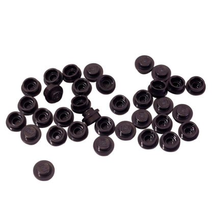 LEGO® round tile 1 x 1 with smooth studless surface, used for clean detailing and decorative finishes, trans-neon black color
