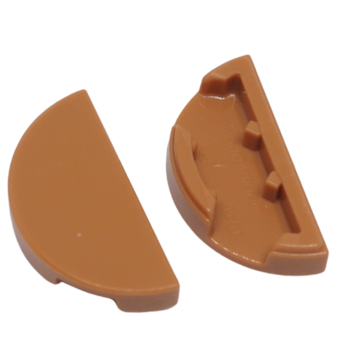 LEGO® Tile Round 1 x 2 Half piece shown in close-up, featuring its smooth curved top and half-moon shape in medium nougat.