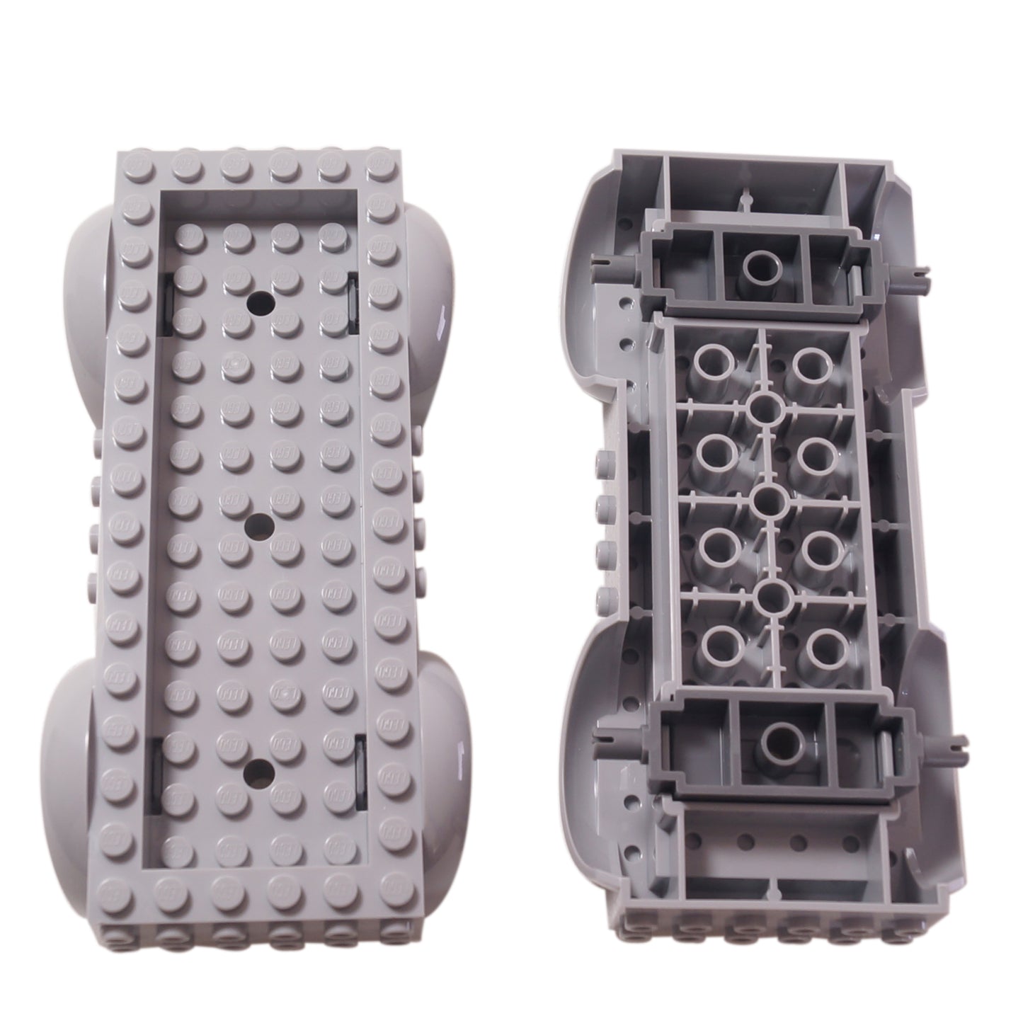 Top and bottom views of a light gray LEGO Vehicle Base 18923c01.
