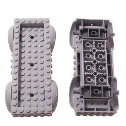 Top and bottom views of a light gray LEGO Vehicle Base 18923c01.