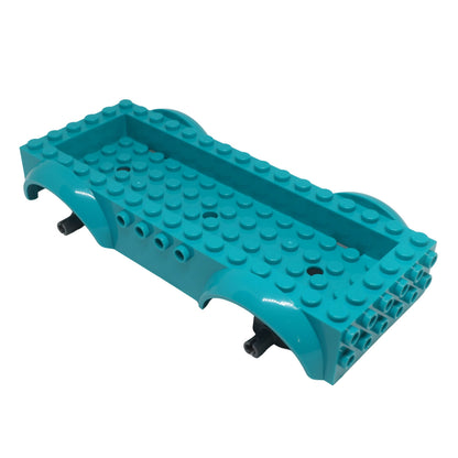 Teal LEGO Vehicle Base 18923c01 with wheel arches, angled view.