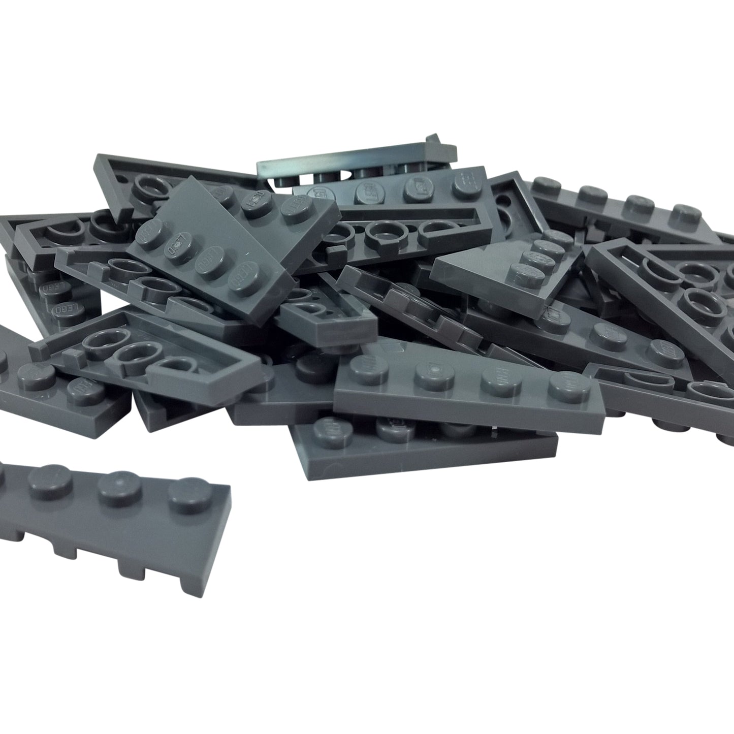 LEGO® Wedge Plate 4 x 2 Right (41769) in dark bluish gray, an angled plate ideal for streamlined vehicles, wings, and detailed asymmetrical designs.
