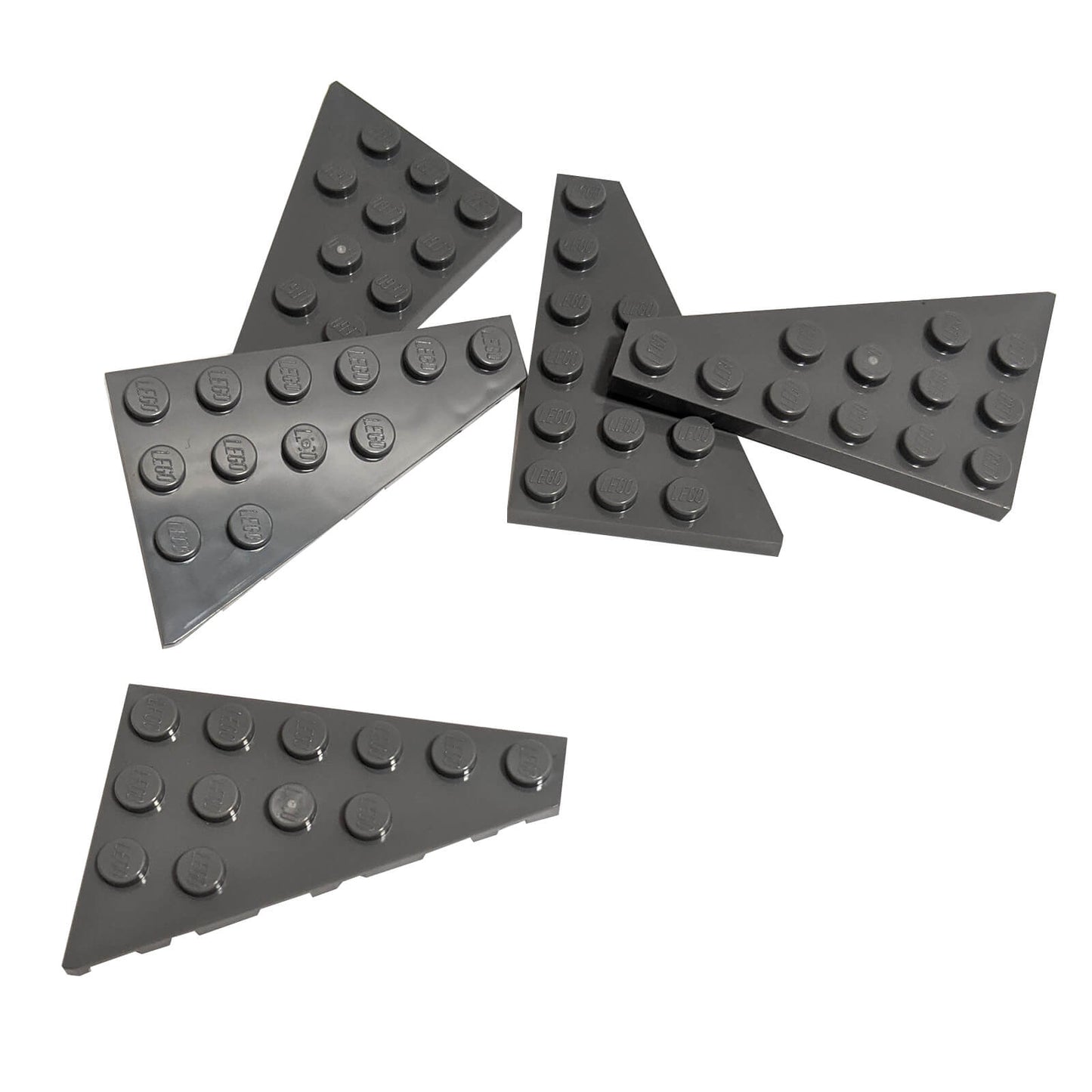 LEGO® Wedge Plate 6 x 4 Right (Part 48205) in dark bluish gray, used for angled surfaces, vehicle bodies, and aerodynamic shaping
