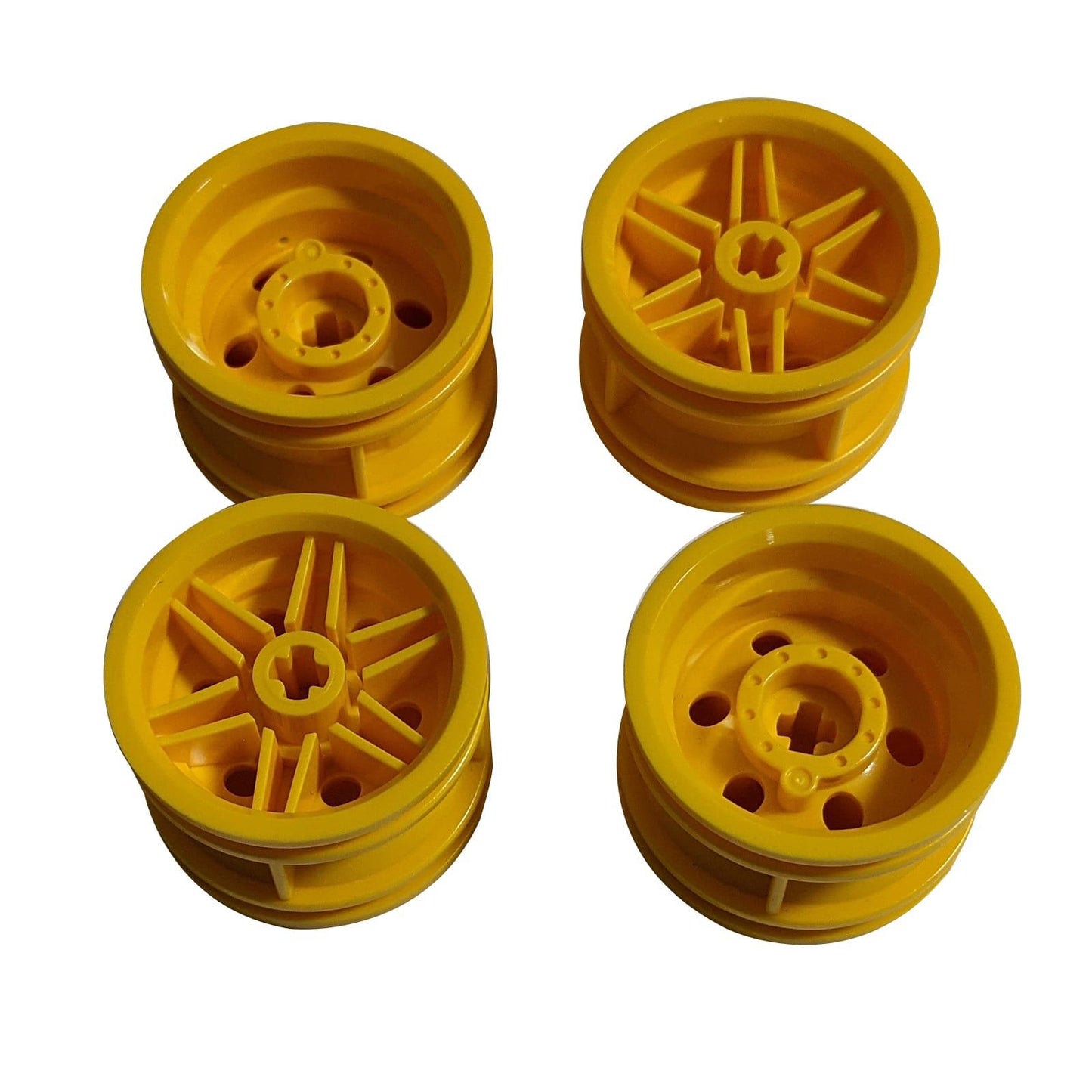 LEGO® wheel 30.4 mm diameter x 20 mm wide with reinforced rim and no pin holes, suitable for vehicles and Technic-style builds, yellow color
