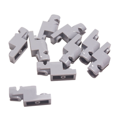 A pile of light gray LEGO Projectile Launcher 15403 pieces.