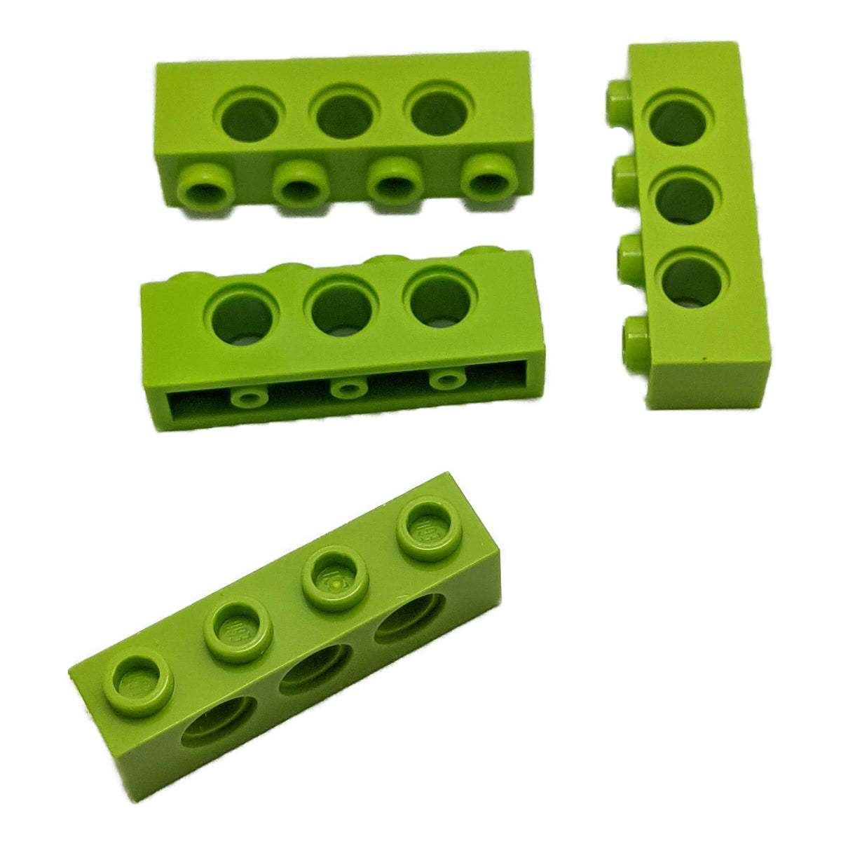 Four Lime LEGO Technic bricks 1x4 with three side holes, part 3701