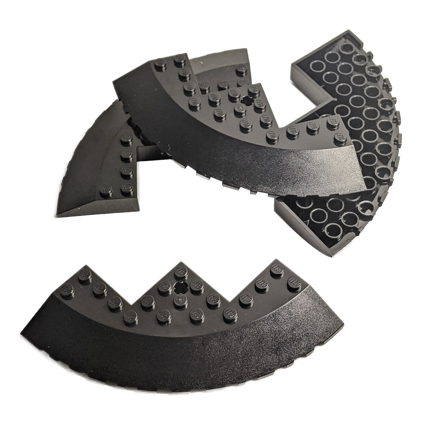 LEGO® round corner brick 10 x 10 with 33 degree sloped edge, axle hole and facet cutout, used for large curved structures or vehicle builds, black color
