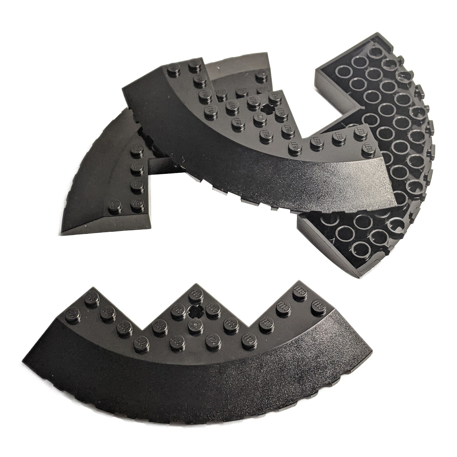 LEGO® round corner brick 10 x 10 with 33 degree sloped edge, axle hole and facet cutout, used for large curved structures or vehicle builds, black color
