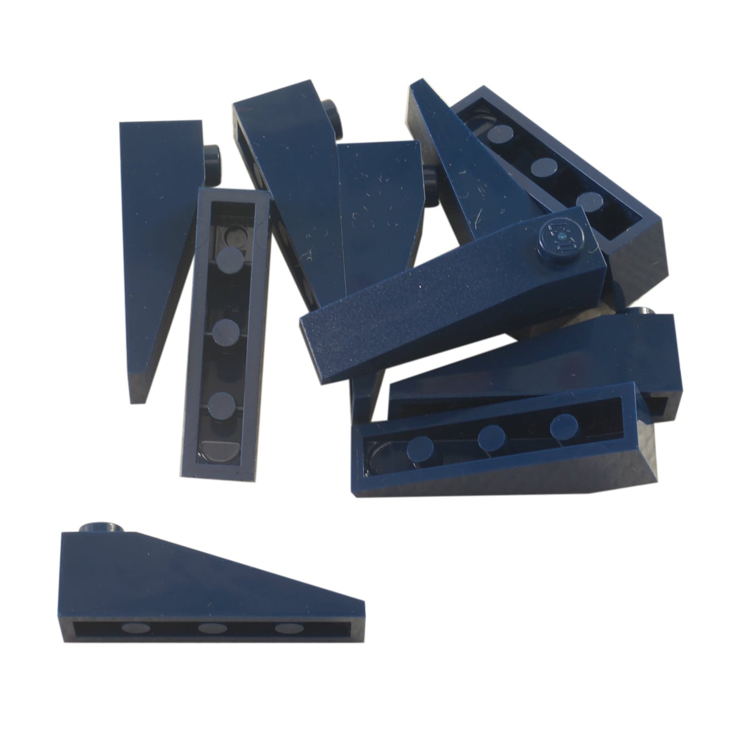 LEGO® slope 18 degree 4 x 1 piece, shallow angled surface for smooth shaping and vehicle detailing, dark blue color
