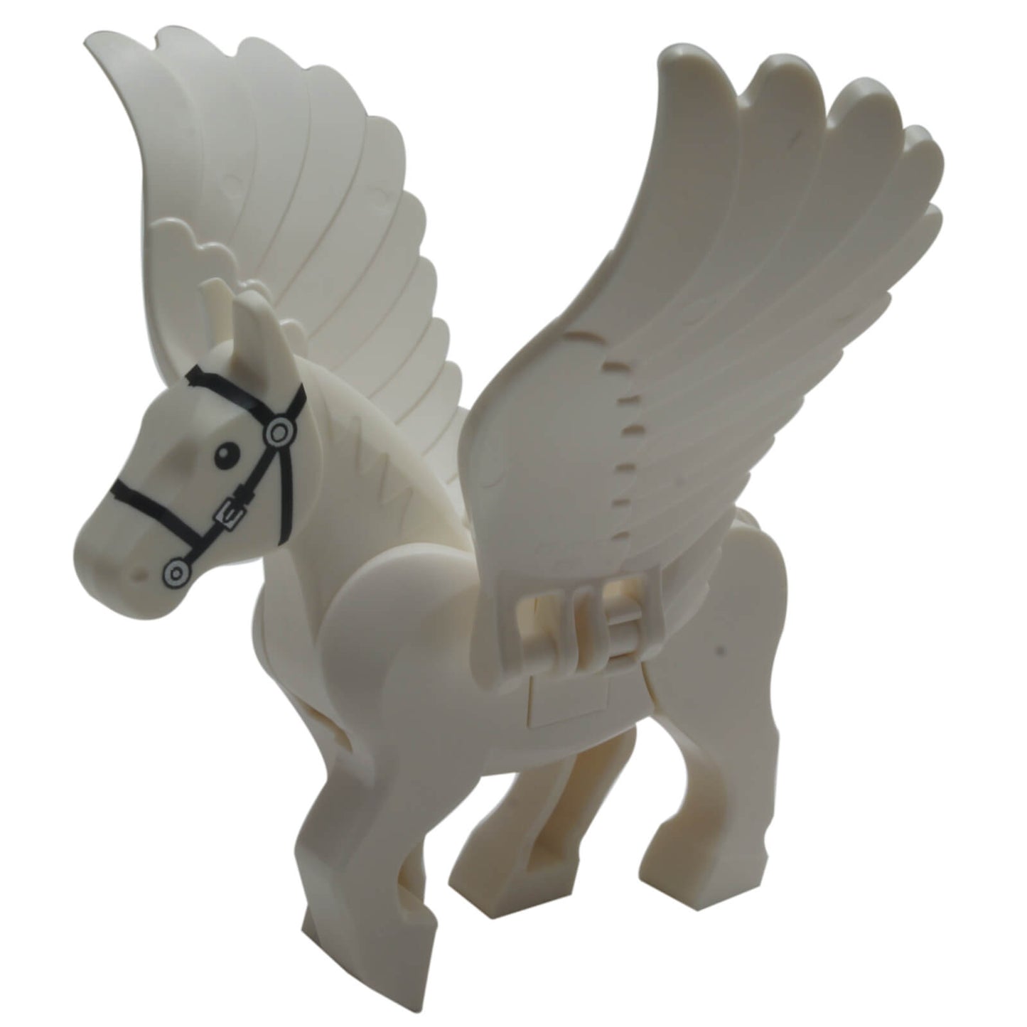 LEGO white Pegasus with wings raised, black bridle, and detailed molded feathers.
