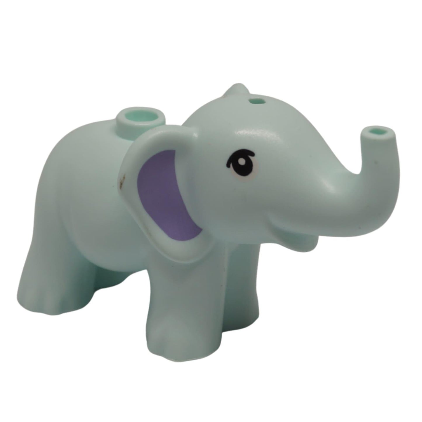 Elefante Friends de color aqua claro con orejas rosas y trompa levantada, vista frontal de la figura animal
