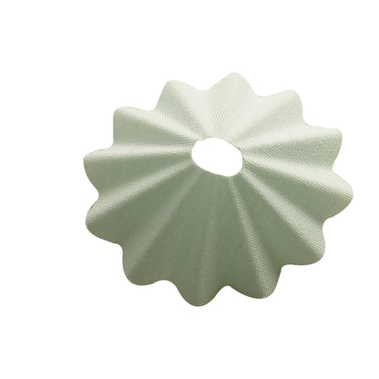Top view of Light Aqua mini doll cloth skirt in traditional starched fabric style, folded into circular layered ruffles with center opening