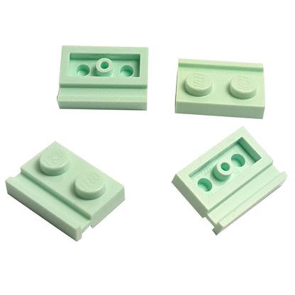 Light aqua modified Plate 1 x 2 with door rail for sliding doors, track guides, and compact wall builds
