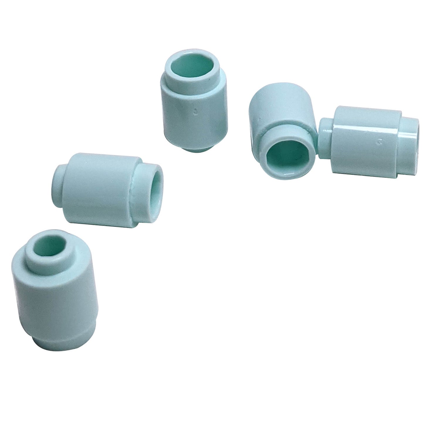 Light aqua round 1 x 1 brick part 3062 with cylindrical shape for LEGO® building details and accents
