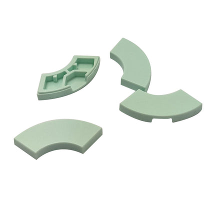 Light aqua Tile round corner 2 x 2 macaroni for curved edges, smooth corners, and clean LEGO® builds
