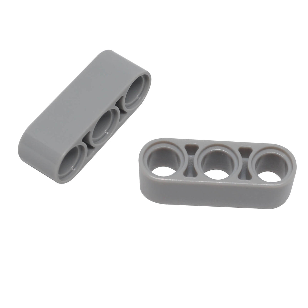 light bluish gray LEGO Technic 1x3 Thick Liftarm pieces (32523) loosely grouped.