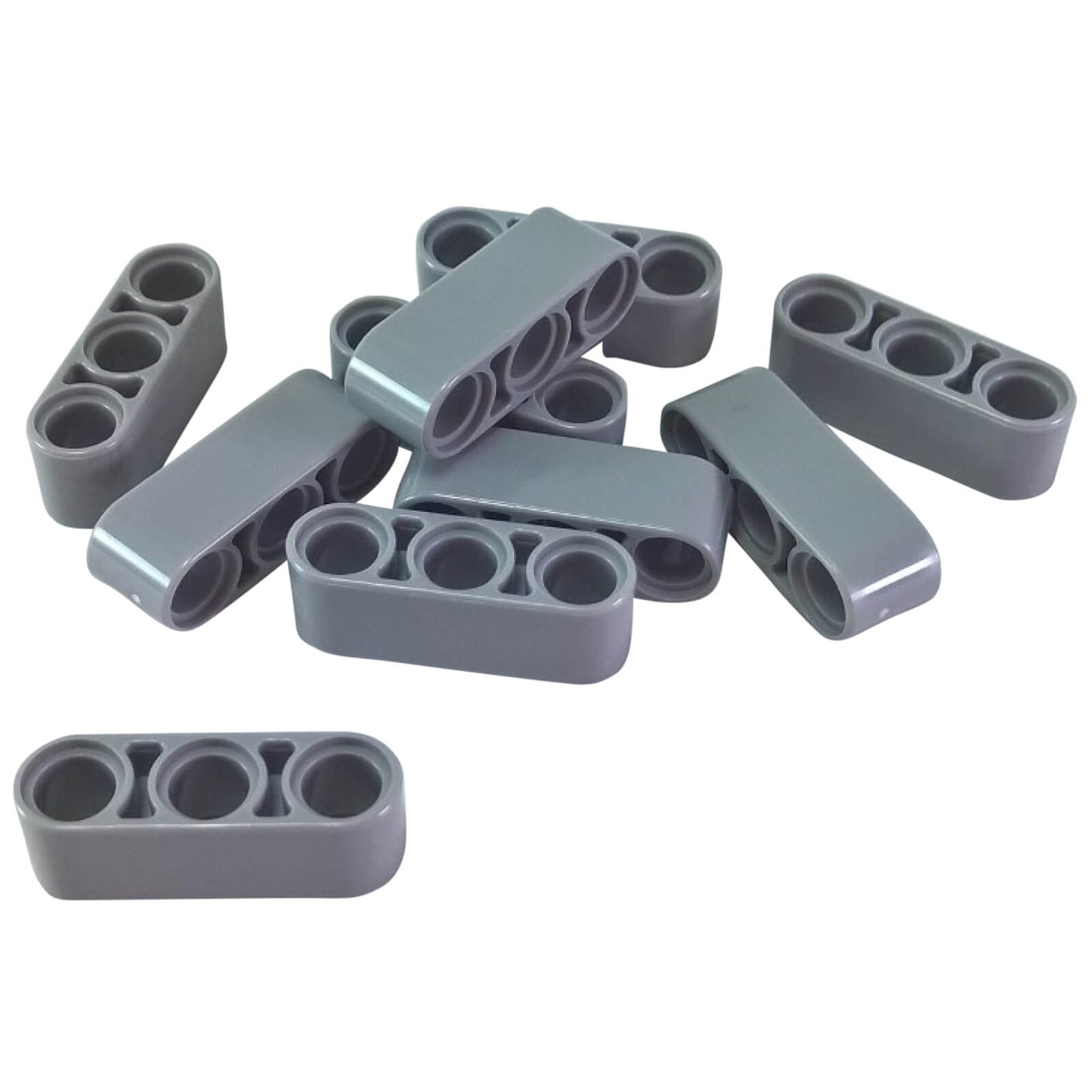 Pile of light bluish-gray LEGO Technic 1x3 Thick Liftarm pieces (32523).