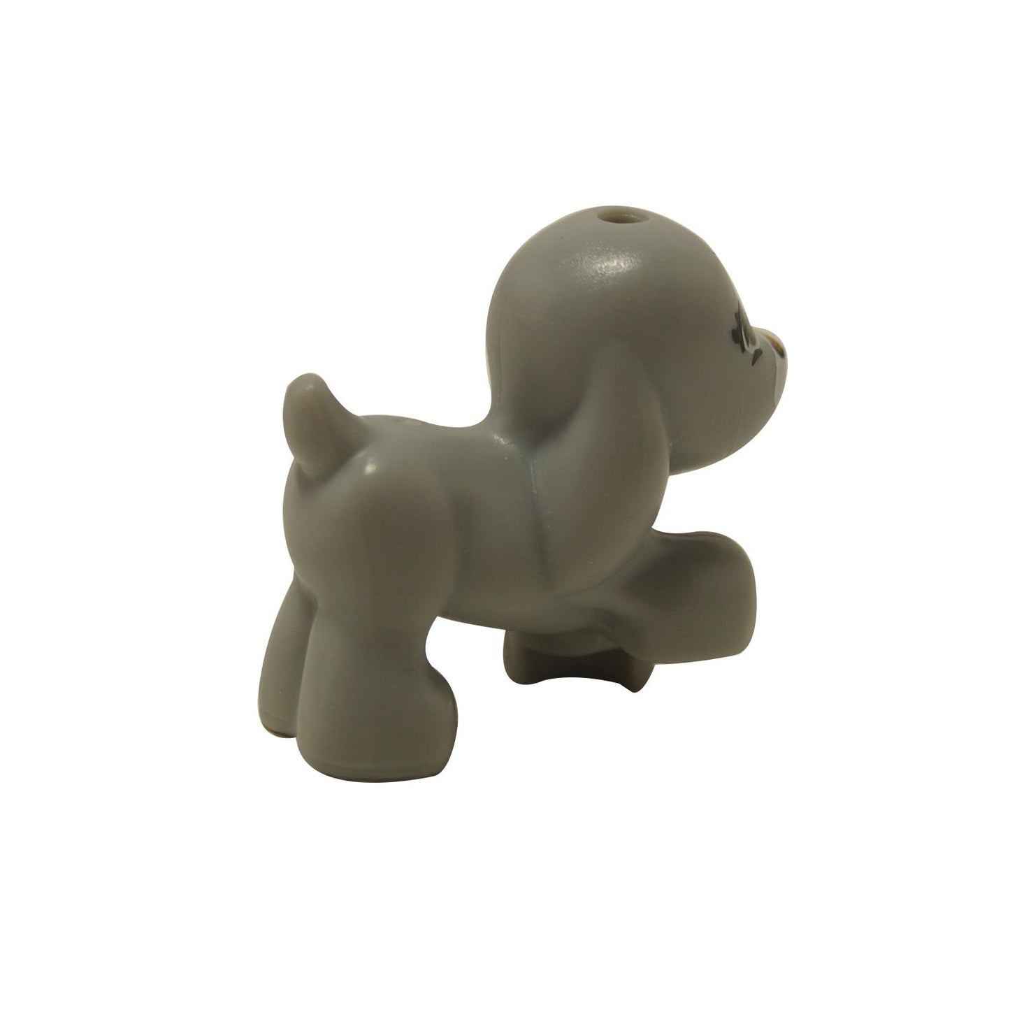 Light bluish gray walking puppy figure with raised front paw and curled tail.
