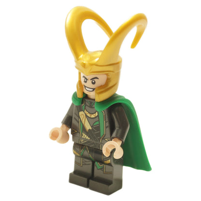 Front angled view of Loki minifigure wearing pearl dark gray suit with green flexible rubber cape and gold horned helmet
