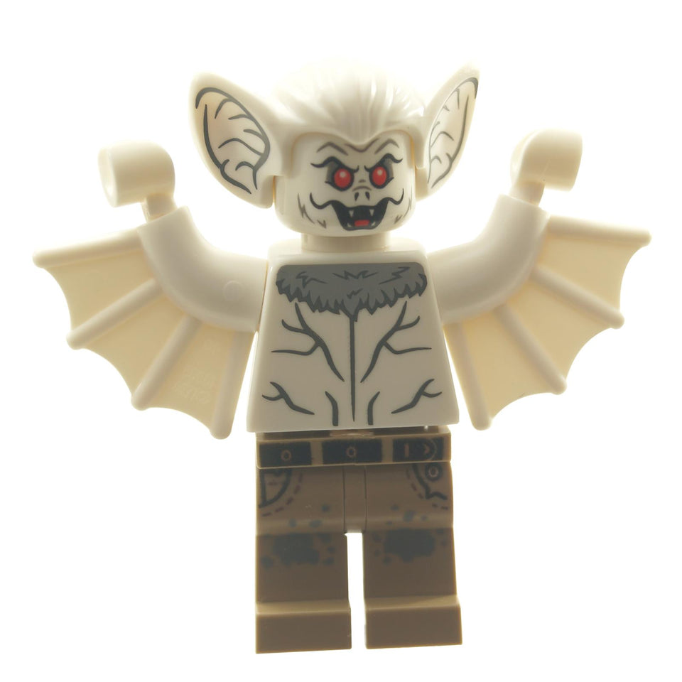 Front view of the LEGO DC Super Heroes Man-Bat - Rebirth minifigure (sh0660). The figure has a pale white head mold featuring large bat ears, menacing red eyes, sharp teeth, and a slight mustache/snout design. It wears pale, veiny white torso printing with a dark grey furry collar, and tan legs printed to look like dirty trousers with a dark belt. It has large, pale, light nougat bat wings attached to the arms.