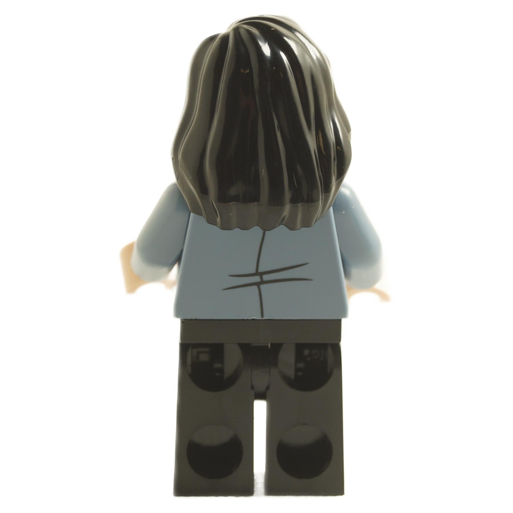 Rear view of Mary Cattermole minifigure hp344 with long dark hair and light blue jacket