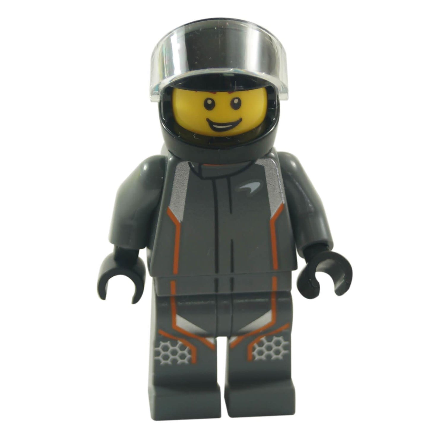 LEGO minifigure representing a McLaren Senna driver, wearing a black racing suit and helmet with a transparent visor.