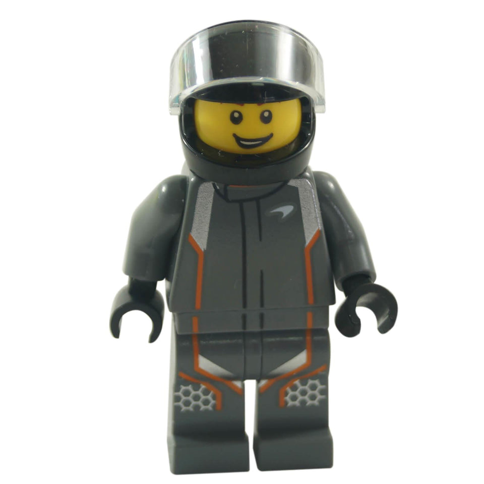 LEGO minifigure representing a McLaren Senna driver, wearing a black racing suit and helmet with a transparent visor.