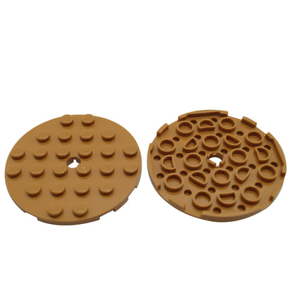 Medium nougat LEGO® Round Plate 6 x 6 part 11213 shown from the top and underside with studs and a central hole