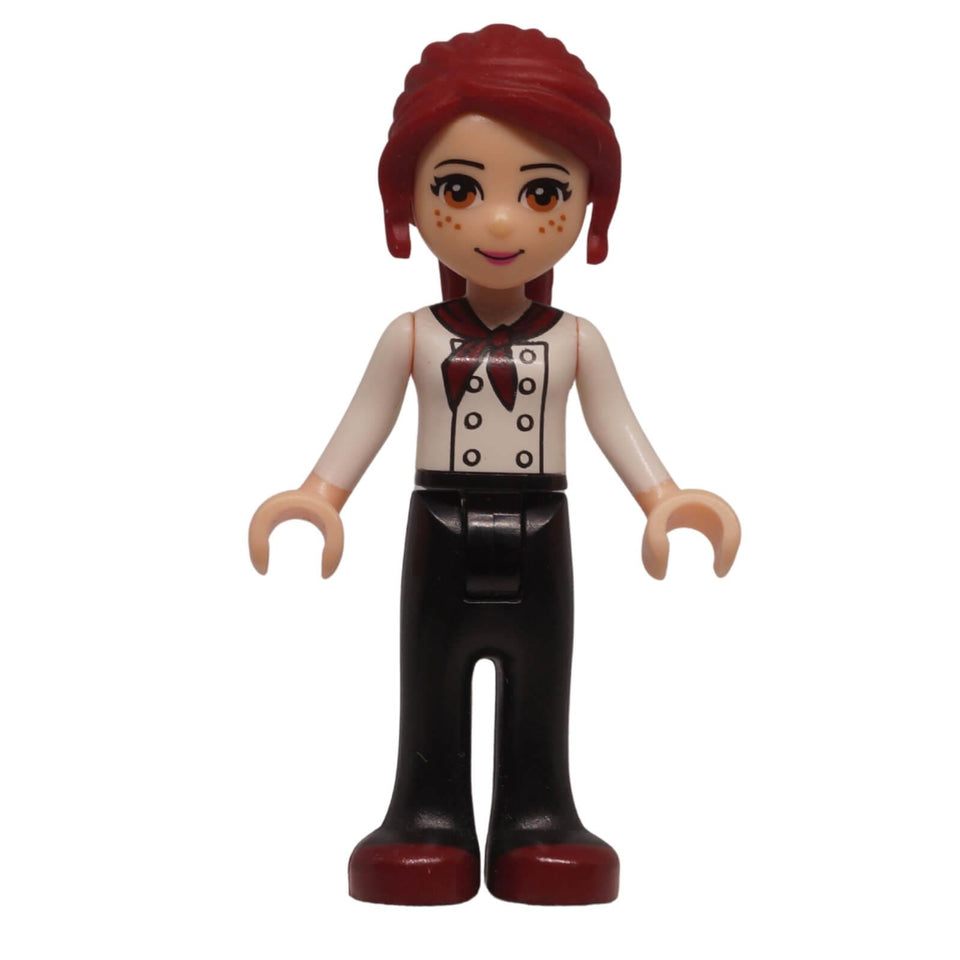 LEGO Friends Mia mini-doll frnd0050 with white top, black trousers, and freckles. From Downtown Bakery set, ideal for character collections.