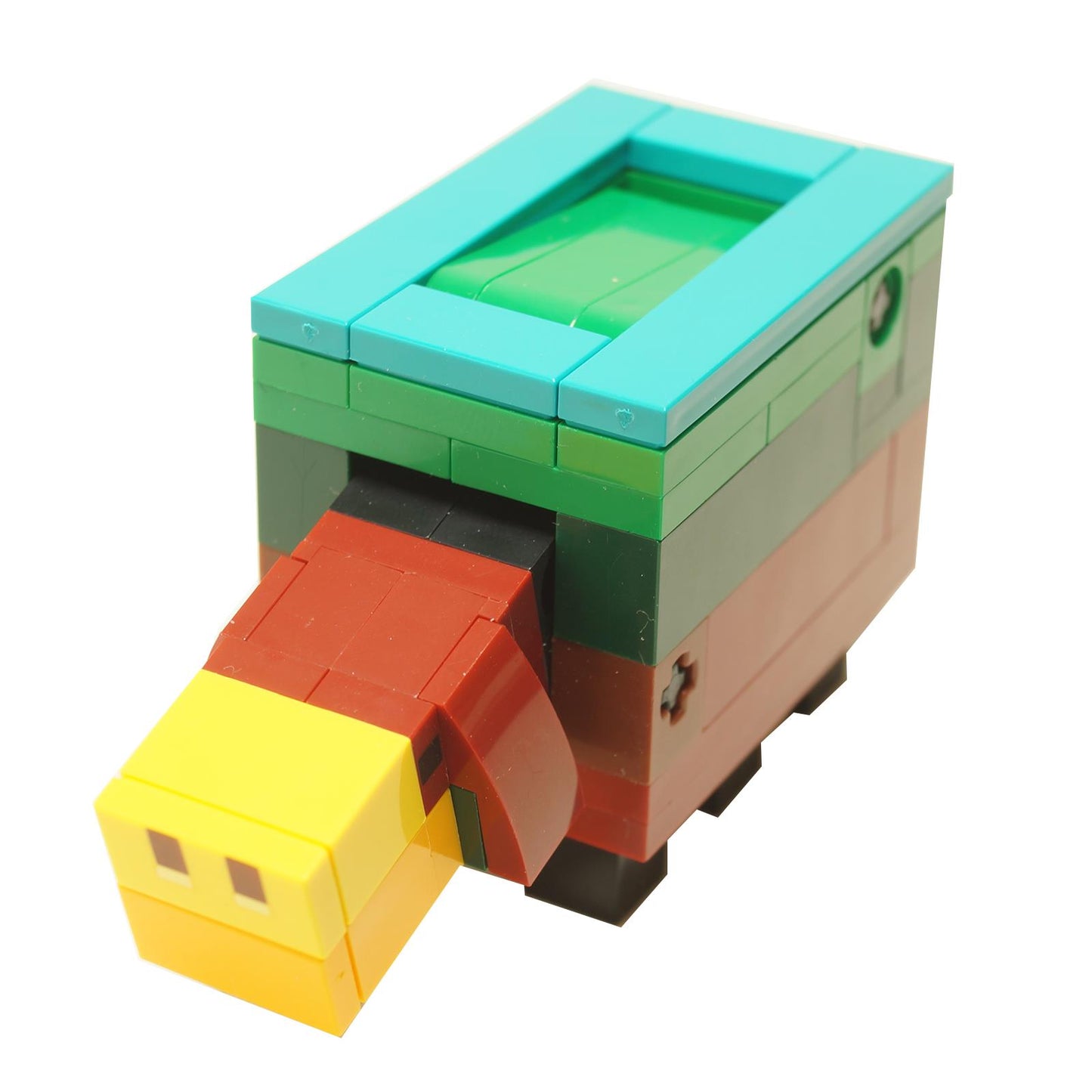 Rear angled view of LEGO Minecraft Baby Sniffer brick-built figure showing teal frame, green top panel, orange and yellow snout, and small black legs