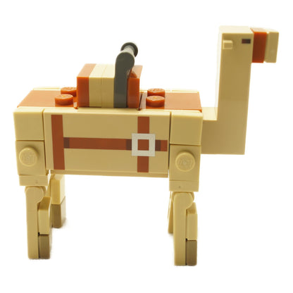 Profile view of LEGO Minecraft brick-built camel version 2 with tan body, printed strap detail, orange saddle block, and block-style articulated legs