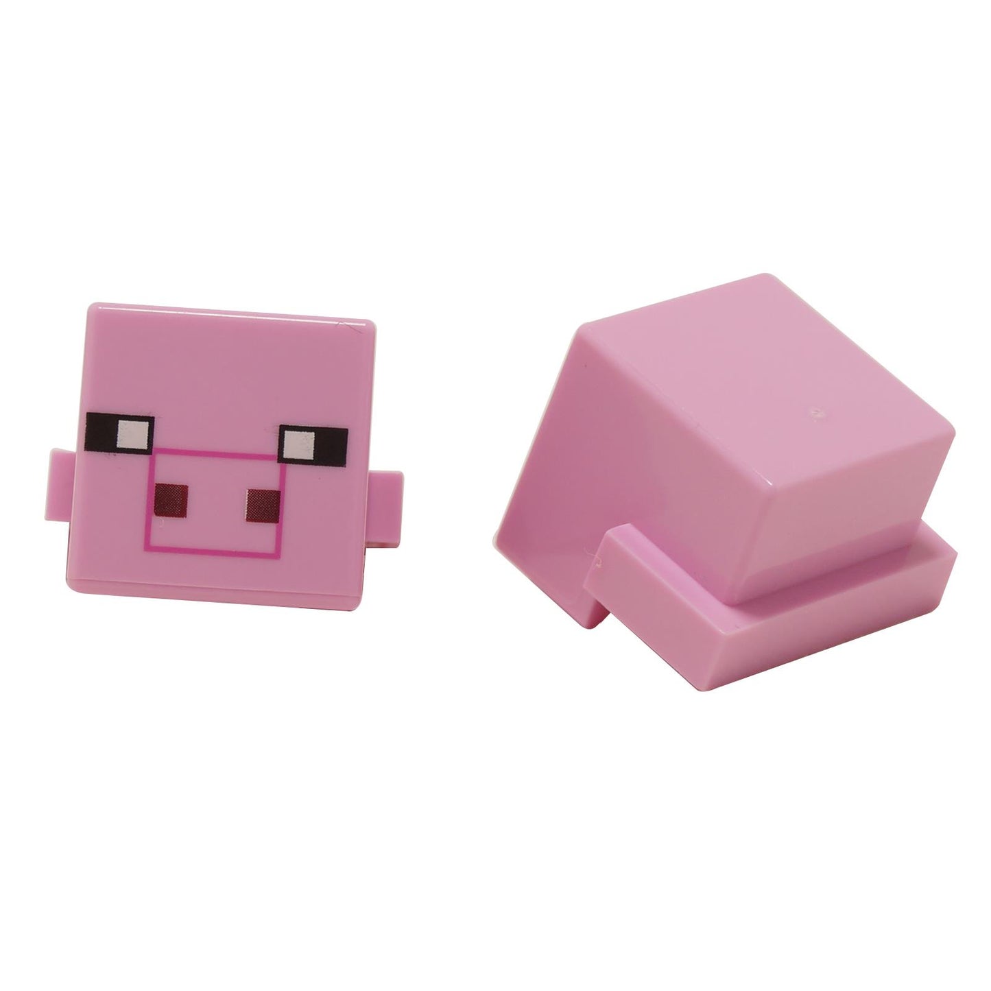LEGO® Minecraft pig head element with pink pixelated face print shown front and back close-up view