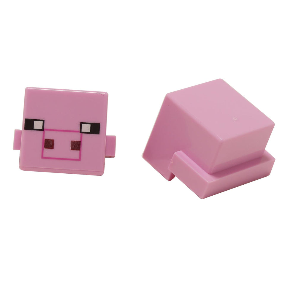 LEGO® Minecraft pig head element with pink pixelated face print shown front and back close-up view
