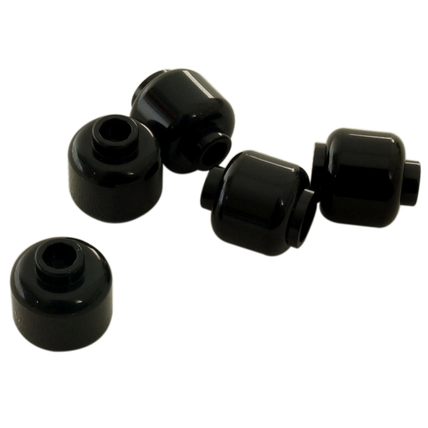 Plain black minifigure head with smooth cylindrical shape, stud on top and hollow underside