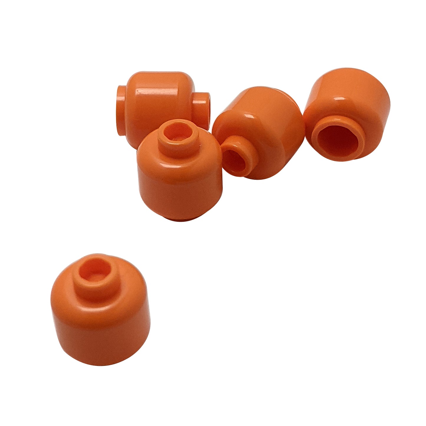 Plain orange minifigure head with smooth cylindrical shape, stud on top and hollow underside