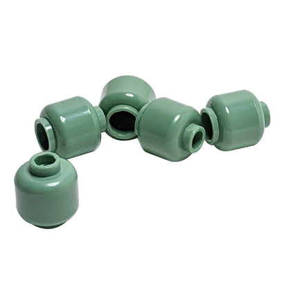 Plain sand green minifigure head with smooth cylindrical shape, stud on top and hollow underside