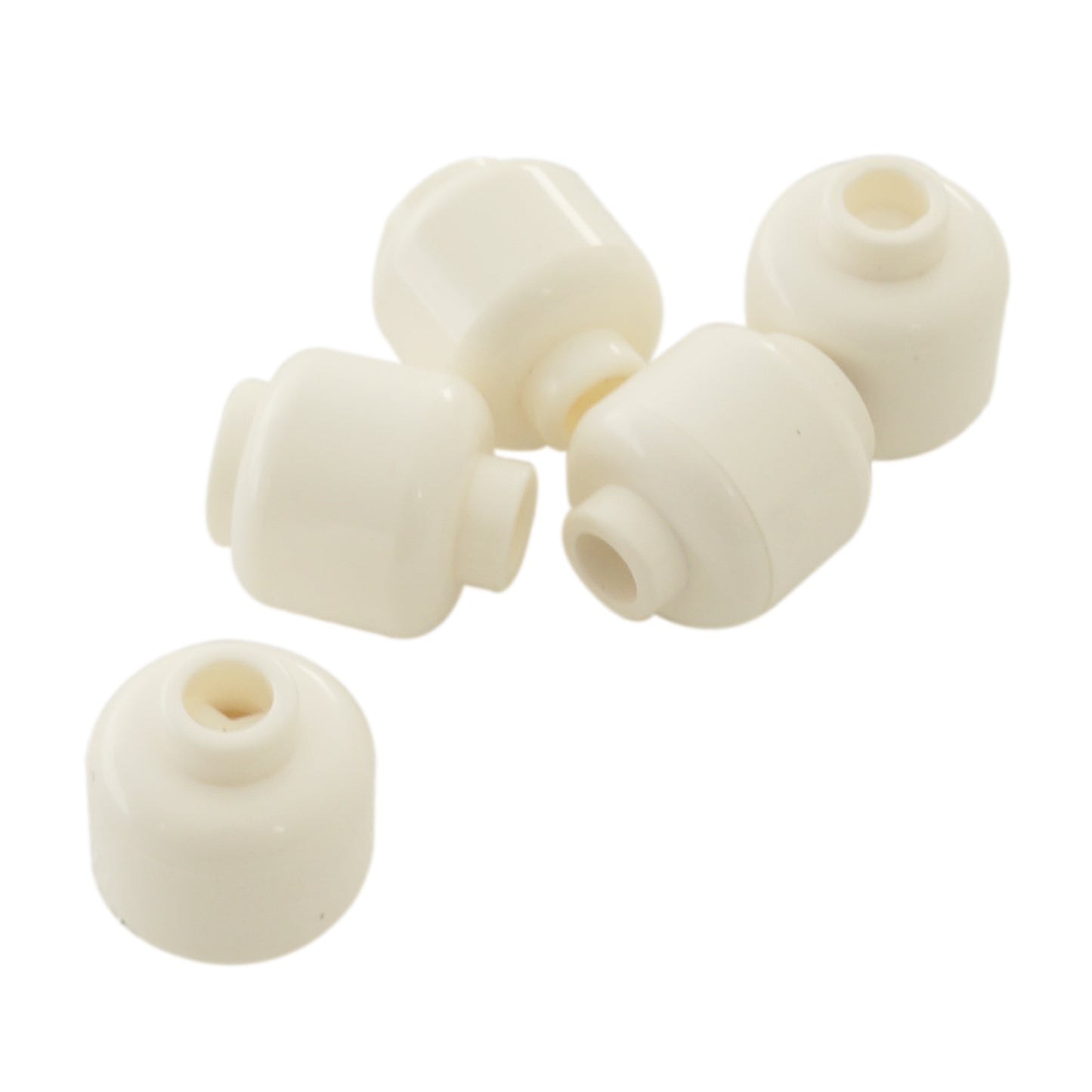 Plain white minifigure head with smooth cylindrical shape, stud on top and hollow underside